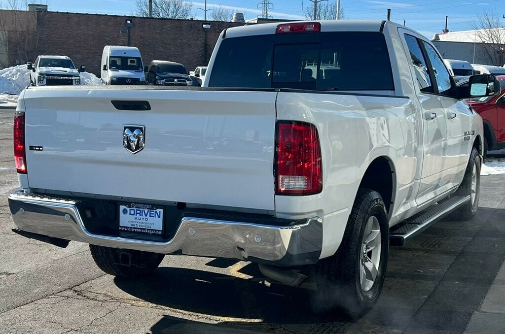 2015 Ram 1500 4WD Quad Cab 140.5" SLT - 22692396 - 4