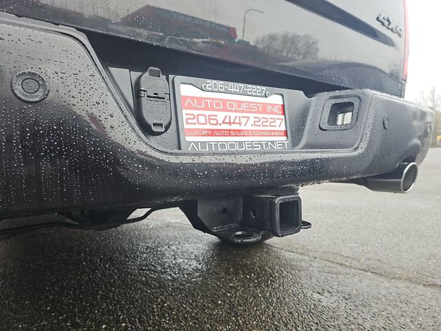 2015 Ram 1500 4WD Quad Cab 140.5" Sport - 22976756 - 24