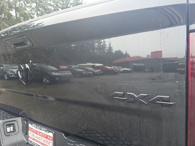 2015 Ram 1500 4WD Quad Cab 140.5" Sport - 22976756 - 25