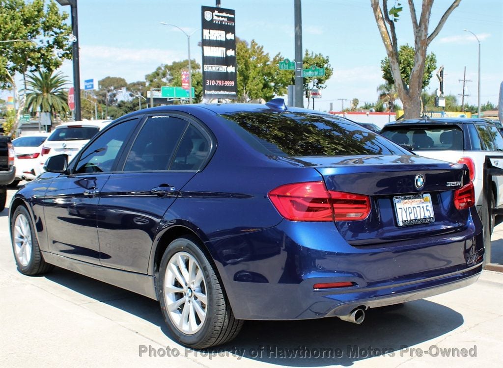 2016 BMW 3 Series 320i - 22570391 - 4