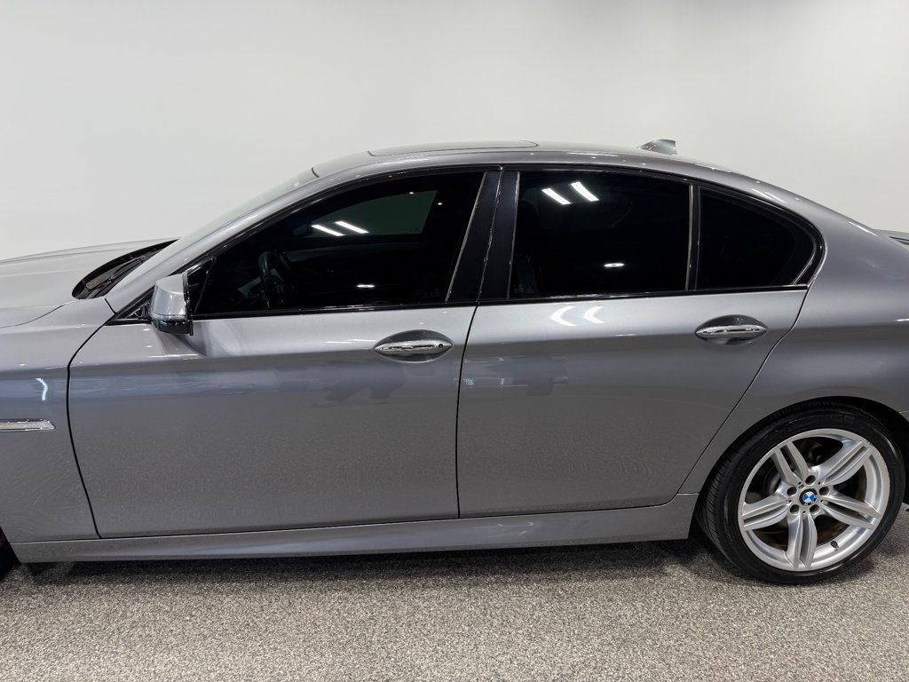 2016 BMW 5 Series 550i xDrive - 23021423 - 52