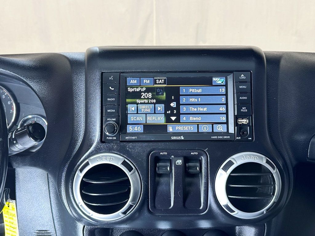 2016 Jeep Wrangler 4WD 2dr Sahara - 23057576 - 24