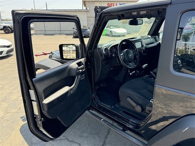 2016 Jeep Wrangler 4WD 2dr Sport - 22546611 - 42