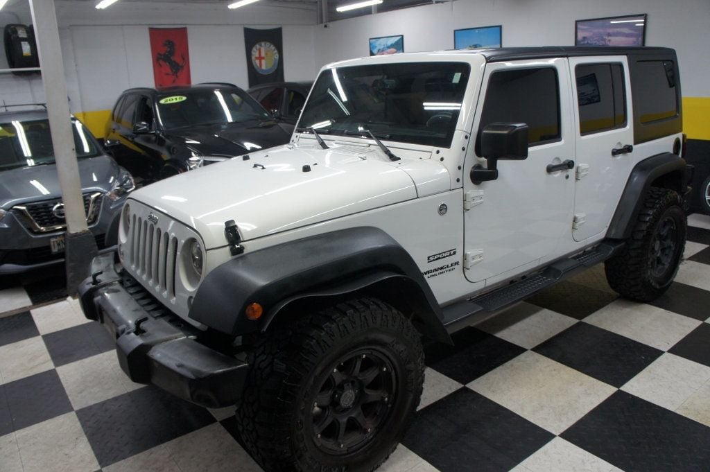 2016 Jeep Wrangler Unlimited 1-Owner, Lifted, Rims and Offroad tires - 22770025 - 19