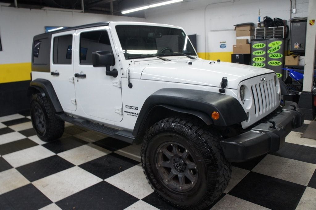 2016 Jeep Wrangler Unlimited 1-Owner, Lifted, Rims and Offroad tires - 22770025 - 3