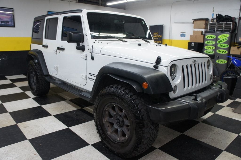 2016 Jeep Wrangler Unlimited 1-Owner, Lifted, Rims and Offroad tires - 22770025 - 4