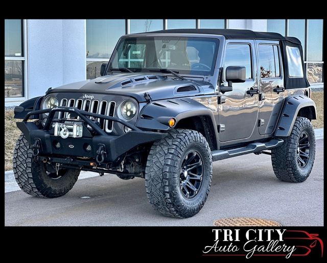 2016 Used Jeep Wrangler Unlimited 2016 JEEP Wrangler LIFTED Unlimited  SAHARA 4X4 at Tri City Auto Gallery Serving Loveland, CO, IID 21789658
