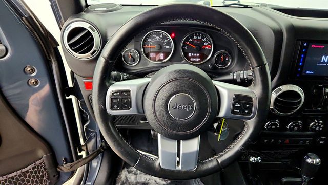 2016 Jeep Wrangler Unlimited 4WD 4dr Rubicon Hard Rock w/ Freedom Top - 23036838 - 12