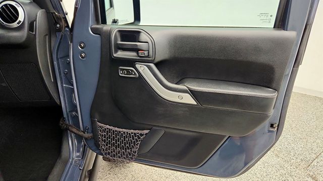 2016 Jeep Wrangler Unlimited 4WD 4dr Rubicon Hard Rock w/ Freedom Top - 23036838 - 24