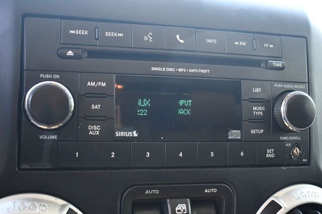 2016 Jeep Wrangler Unlimited 4WD 4dr Sahara - 22917236 - 34