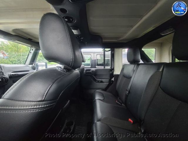 2016 Jeep Wrangler Unlimited 4WD 4dr Sahara - 23074105 - 9