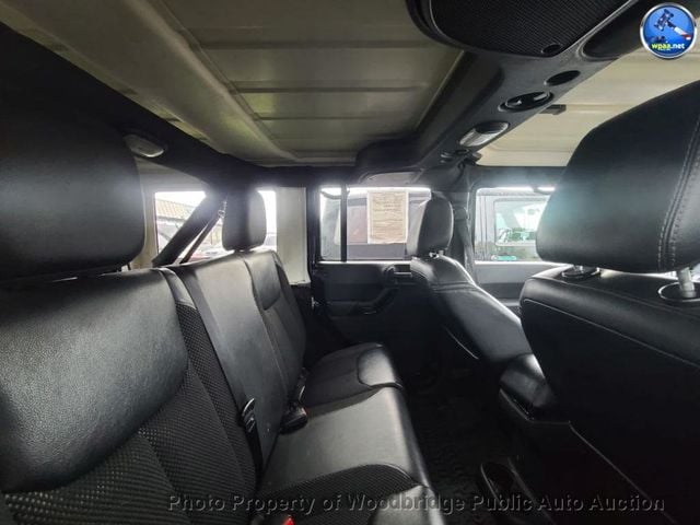 2016 Jeep Wrangler Unlimited 4WD 4dr Sahara - 23074105 - 12