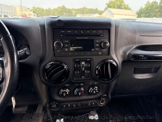 2016 Jeep Wrangler Unlimited 4WD 4dr Sahara - 23074105 - 23