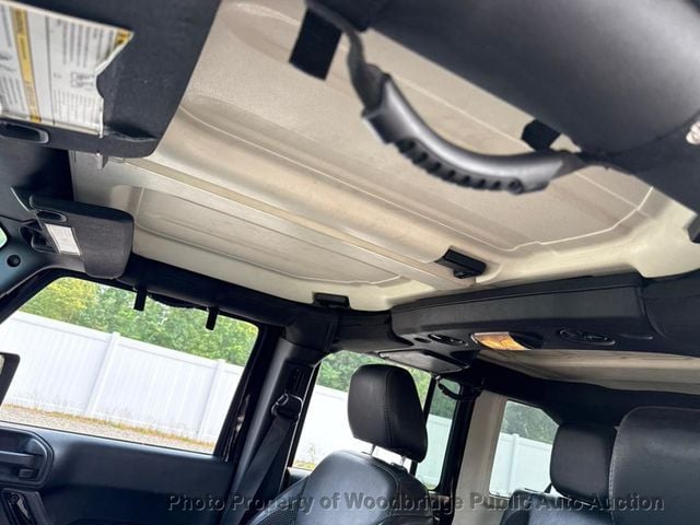 2016 Jeep Wrangler Unlimited 4WD 4dr Sahara - 23074105 - 24