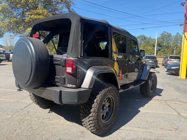 2016 Jeep Wrangler Unlimited 4WD 4dr Sahara - 22939175 - 14