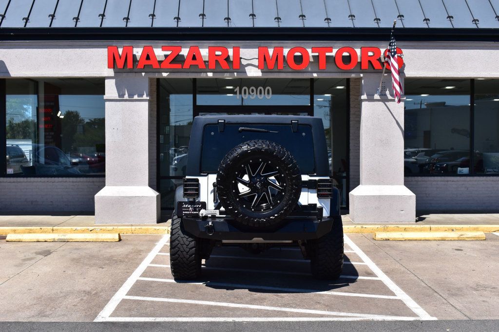 2016 Jeep Wrangler Unlimited 4WD 4dr Sport - 22999677 - 9