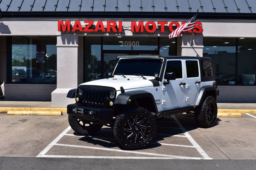 2016 Jeep Wrangler Unlimited 4WD 4dr Sport - 22999677 - 1