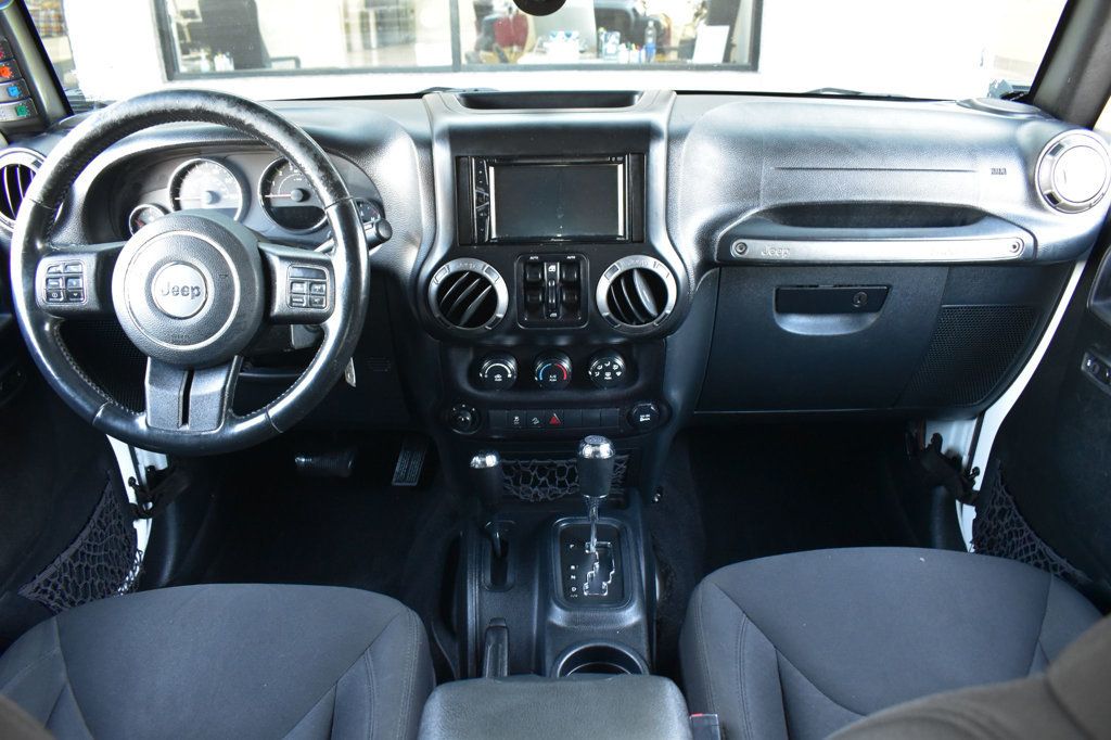 2016 Jeep Wrangler Unlimited 4WD 4dr Sport - 22999677 - 24