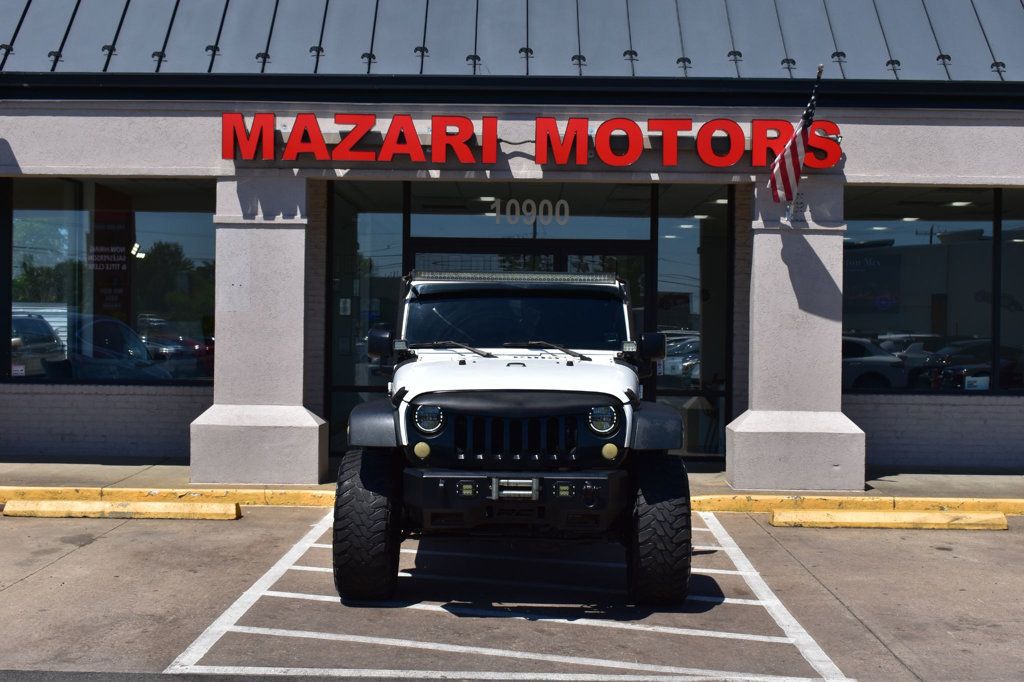 2016 Jeep Wrangler Unlimited 4WD 4dr Sport - 22999677 - 6
