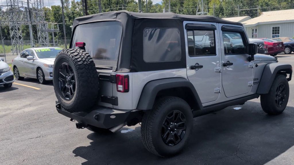 Jeep Wrangler Unlimited 4WD 4dr Sport photo 8