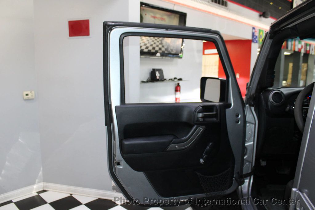 2016 Jeep Wrangler Unlimited 4WD 4dr Sport - 22942428 - 11