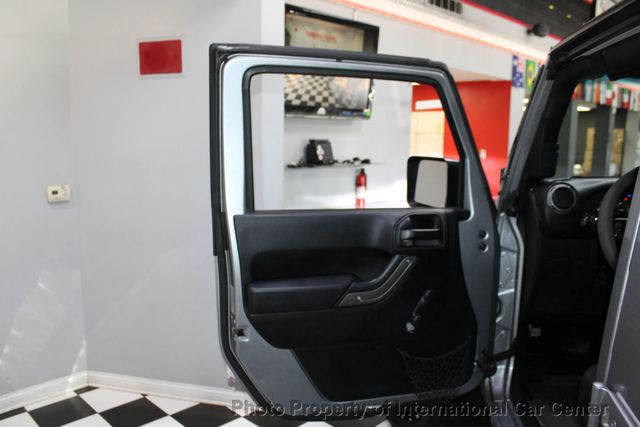 2016 Jeep Wrangler Unlimited 4WD 4dr Sport - 22942428 - 11