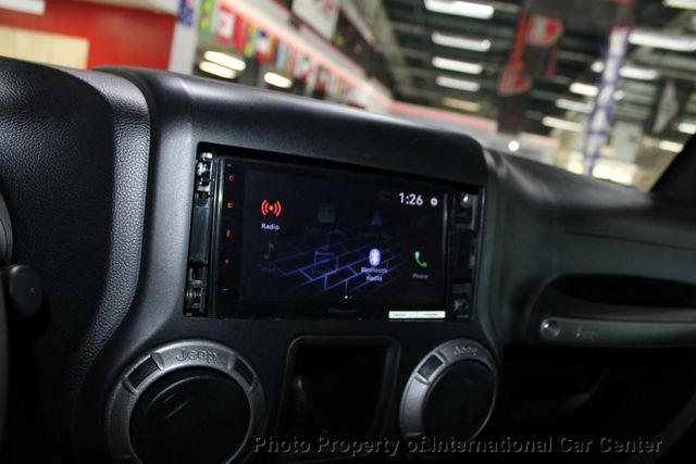 2016 Jeep Wrangler Unlimited 4WD 4dr Sport - 22942428 - 19