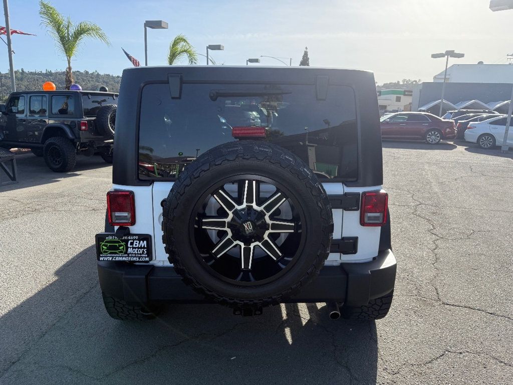 2016 Jeep Wrangler Unlimited 4WD 4dr Sport - 22662497 - 7