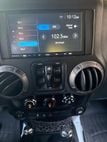 2016 Jeep Wrangler Unlimited 4WD 4dr Sport - 22902331 - 24
