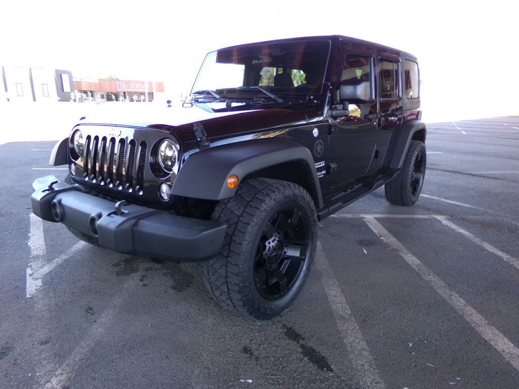 2016 Jeep Wrangler Unlimited 4WD 4dr Sport - 23021160 - 1