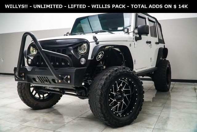 Used 2016 Jeep Wrangler Unlimited Willys Wheeler with VIN 1C4BJWDG2GL171809 for sale in Kennesaw, GA