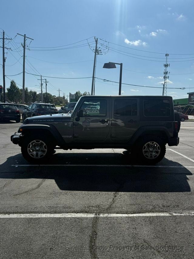 2016 Jeep Wrangler Unlimited 4WD RUBICON W/3-PIECE HARDTOP & ALPINE SOUND - 23071399 - 4