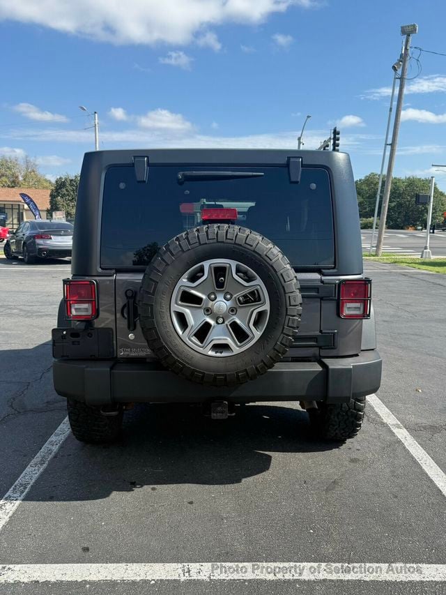2016 Jeep Wrangler Unlimited 4WD RUBICON W/3-PIECE HARDTOP & ALPINE SOUND - 23071399 - 6