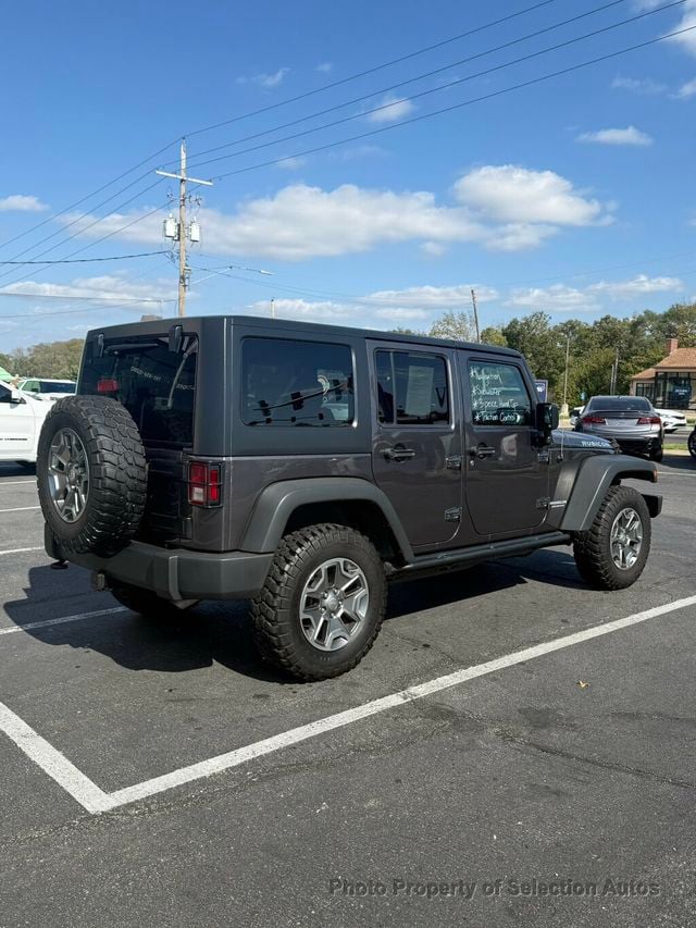 2016 Jeep Wrangler Unlimited 4WD RUBICON W/3-PIECE HARDTOP & ALPINE SOUND - 23071399 - 7