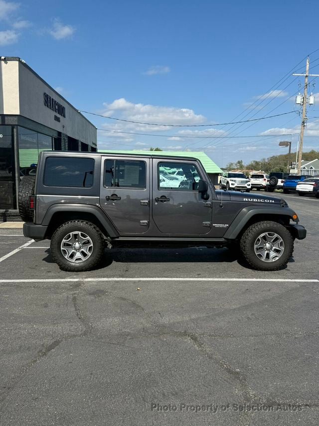 2016 Jeep Wrangler Unlimited 4WD RUBICON W/3-PIECE HARDTOP & ALPINE SOUND - 23071399 - 8