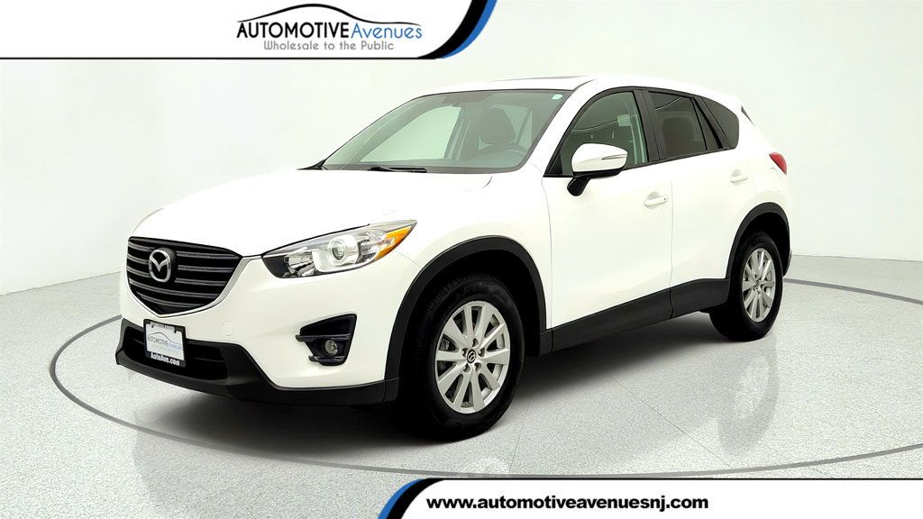 2016 Mazda CX-5 2016.5 AWD 4dr Automatic Touring w/ Bose/Moonroof Pkg - 23046014 | Video 1