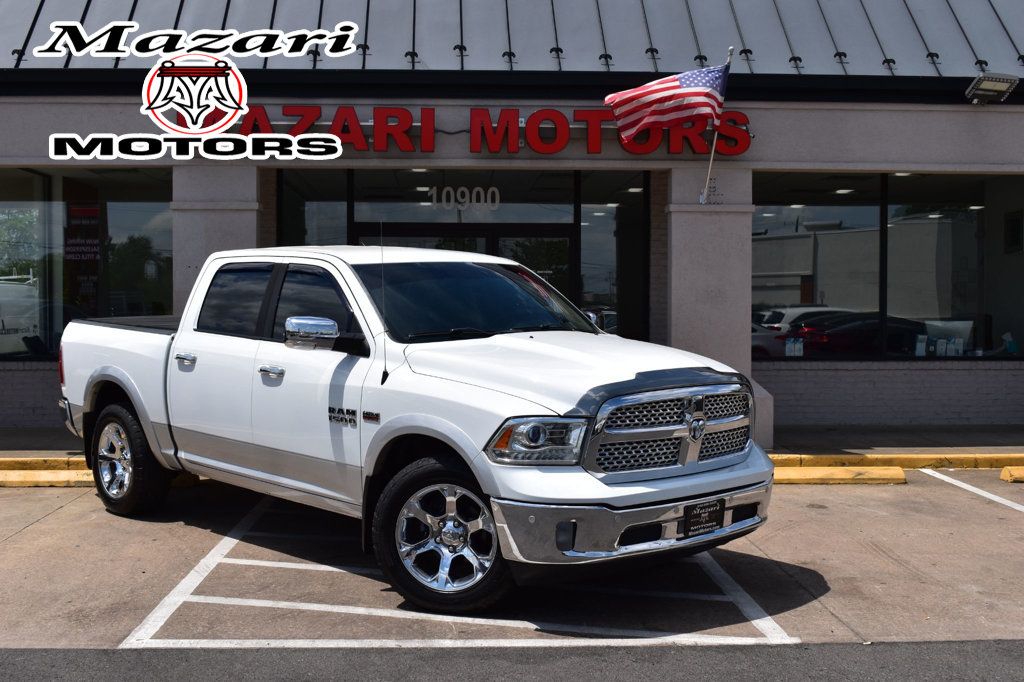 2016 Ram 1500 4WD Crew Cab 140.5" Laramie - 22839310 - 0
