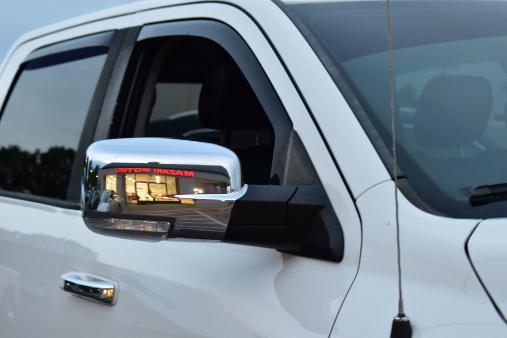 2016 Ram 1500 4WD Crew Cab 140.5" Laramie - 22839310 - 62