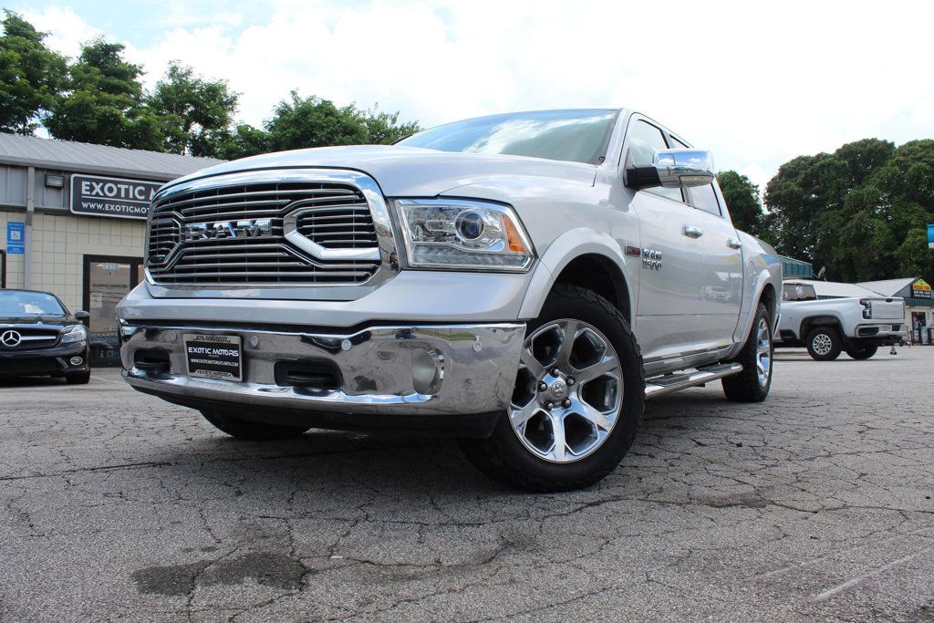 2016 Ram 1500 4WD Crew Cab 140.5" Laramie - 22397523 - 74