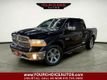 2016 Ram 1500 4WD Crew Cab 140.5" Laramie - 22982595 - 0