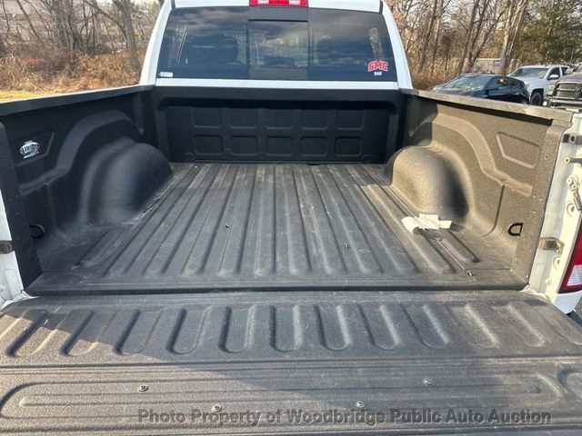 2016 Ram 1500 4WD Crew Cab 140.5" SLT - 22970762 - 11