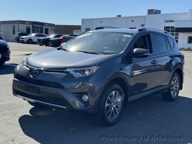 Used 2016 Toyota RAV4 XLE with VIN JTMRJREV8GD048975 for sale in Riverhead, NY