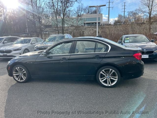 2017 BMW 3 Series 330i xDrive - 22770397 - 11