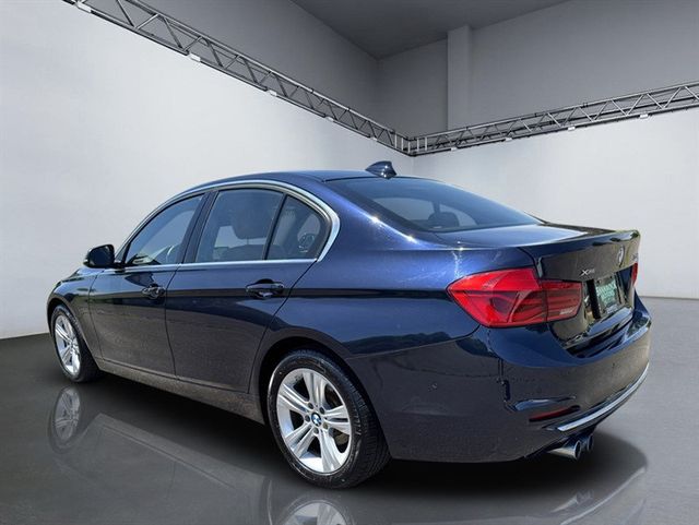 2017 BMW 3 Series 330i xDrive - 23037522 - 4