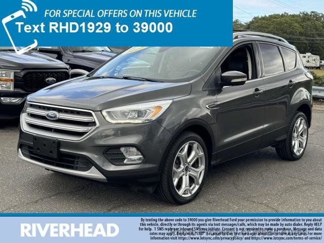 Used 2017 Ford Escape Titanium with VIN 1FMCU9JD0HUB11929 for sale in Riverhead, NY