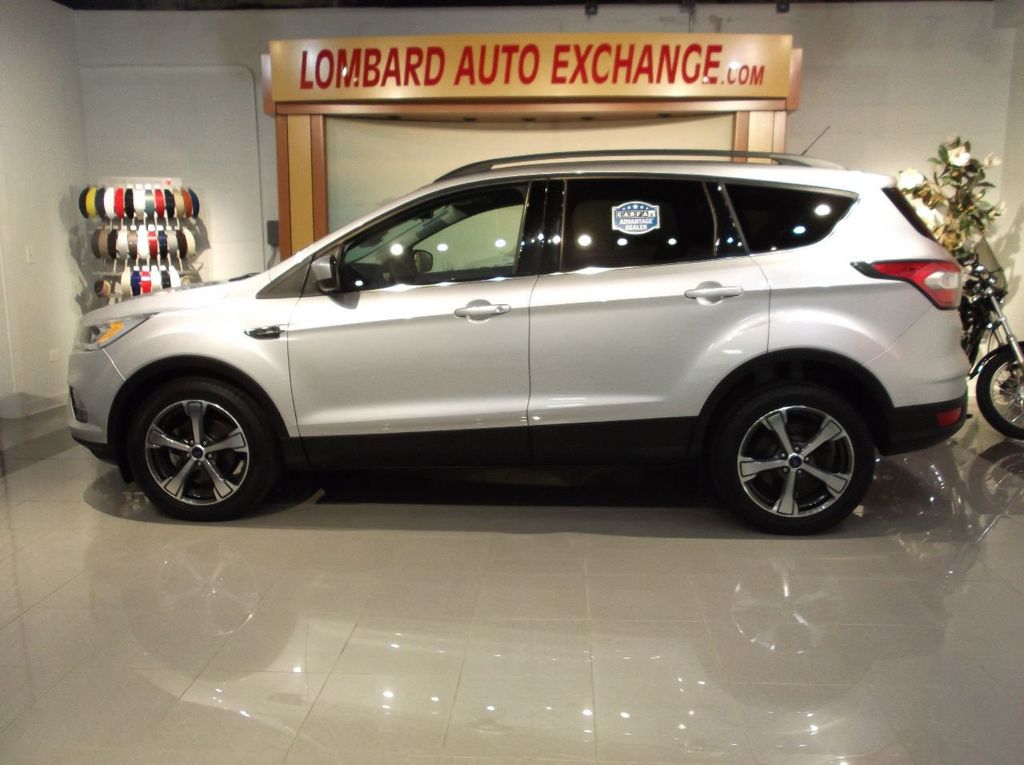 2017 Ford ESCAPE  SE LEATHER ONE OWNER  LEATHER INTERIOR  PANORAMIC MOONROOF  BLIND SPOT - 19348629 | Video 1