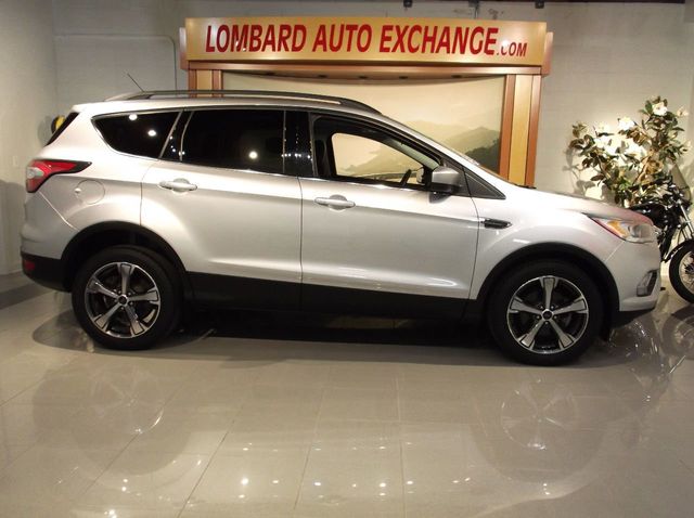 2017 Ford ESCAPE  SE LEATHER ONE OWNER  LEATHER INTERIOR  PANORAMIC MOONROOF  BLIND SPOT - 19348629 - 4