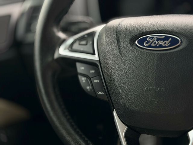 2017 Ford Fusion Energi Titanium Sedan - 22986354 - 24