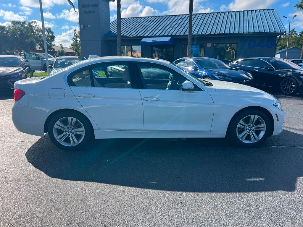 2018 BMW 3 Series 330i - 22618373 - 3