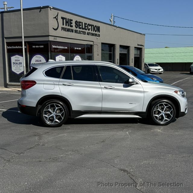 2018 BMW X1 X1 xDRIVE 28i SPORTS ACTIVITY W/NAVIGATION & PANO ROOF - 23071391 - 14